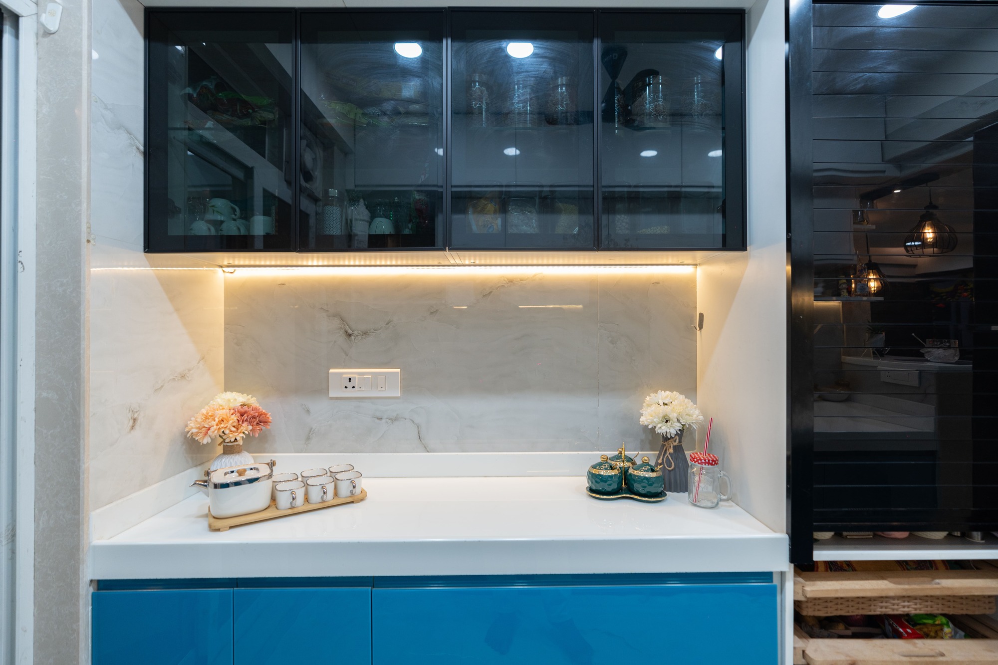 U-shape modular kitchen interior for residential homes by Indus Studio
