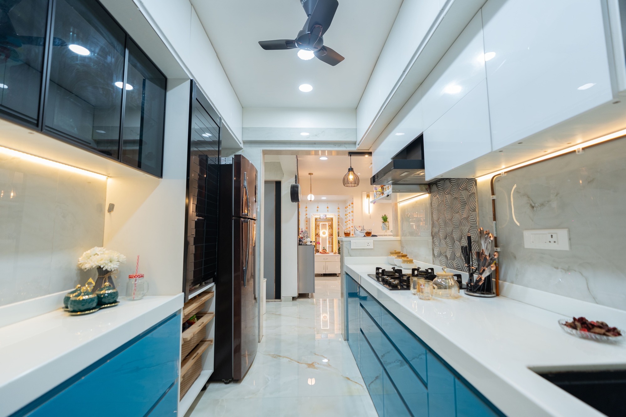 Modern kitchen interior with modular storage solutions by Indus Studio